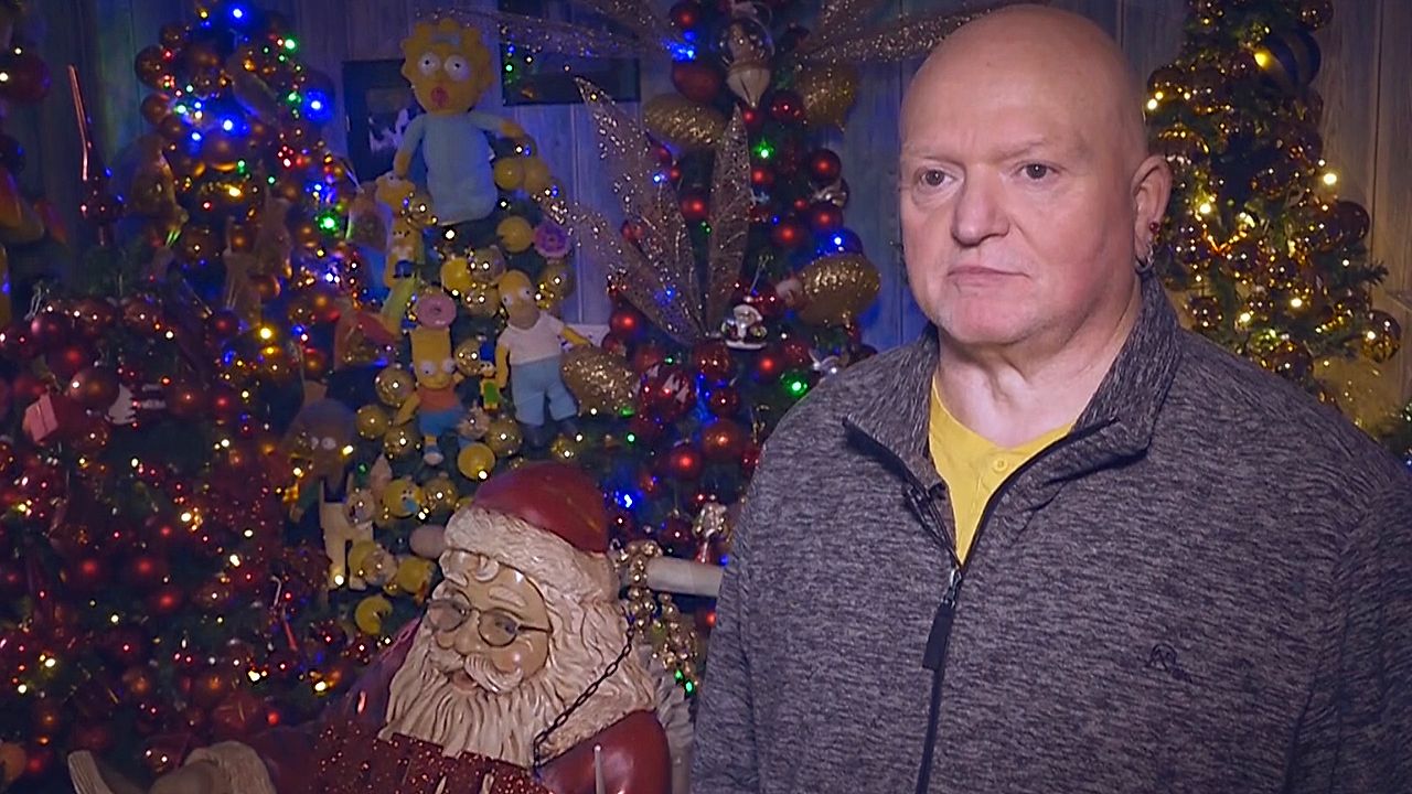 Couple sets new world record with 621 Christmas trees at home