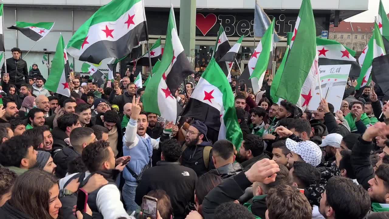 Germany: Syrian crowds rally in Berlin on first anniversary of Assad's fall