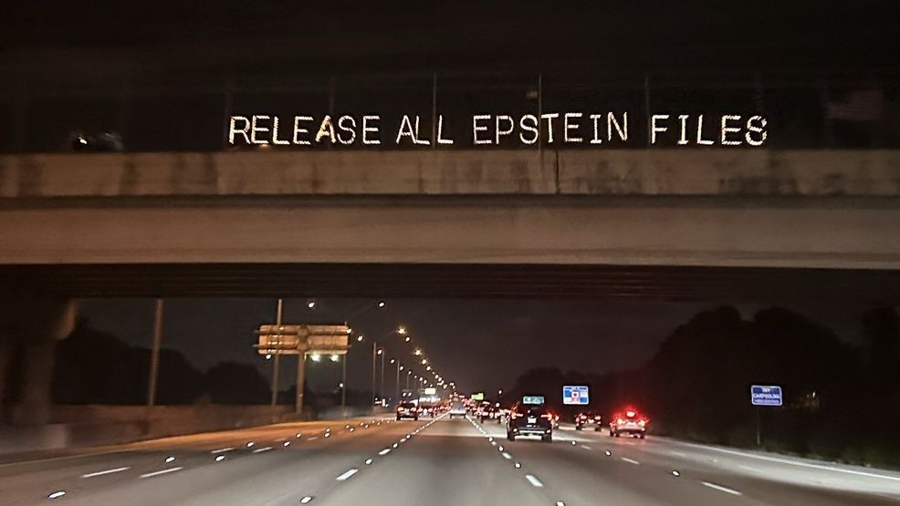 Neon sign demanding Epstein file release appears over I-95 in Palm ...