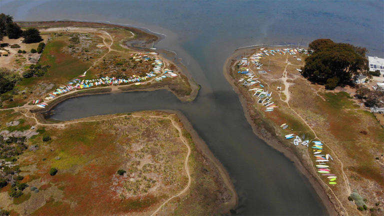 Community group officially buys popular coastal property to keep public ...