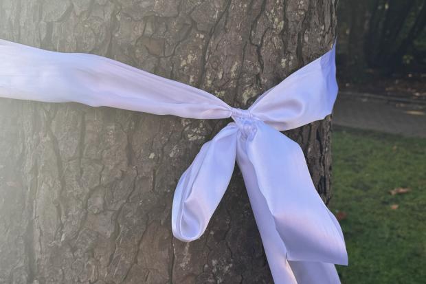 What a tied white ribbon means and why you might see more of them in ...