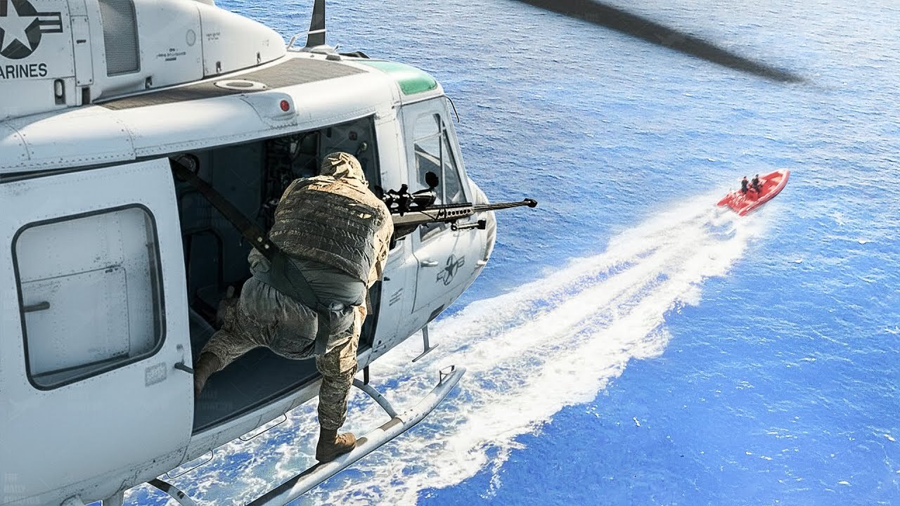US Marines sniper firing at moving target during high speed chase