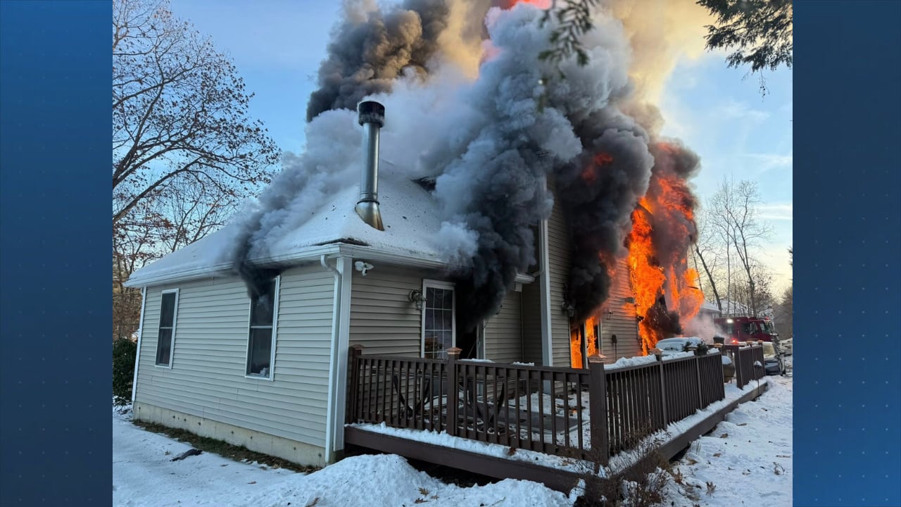 Crews battle large house fire in Tyngsboro
