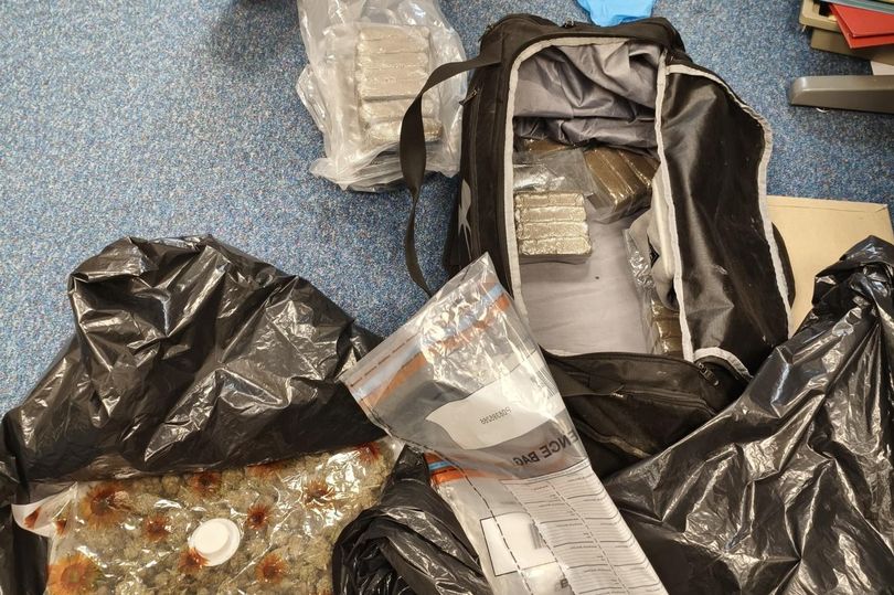 Two men arrested as drugs found after car stopped at police checkpoint