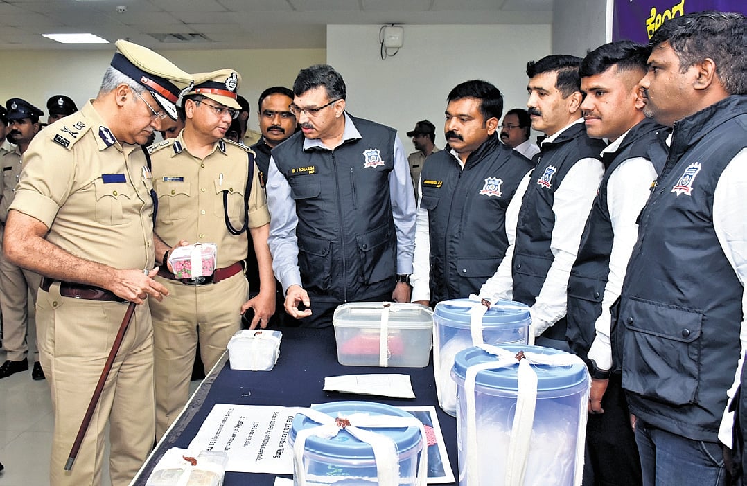 Police Commissioner Seemanth Kumar Singh and DCP Crime Raja Imam Kasim P inspect the seized drugs worth Rs 23.74 crore in Bengaluru on Tuesday