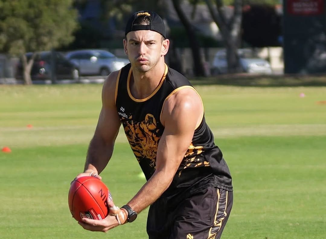Former three-club AFL midfielder calls time