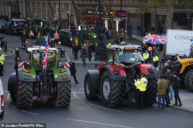 Furious farmers defy tractor ban as they drive to Westminster in ...