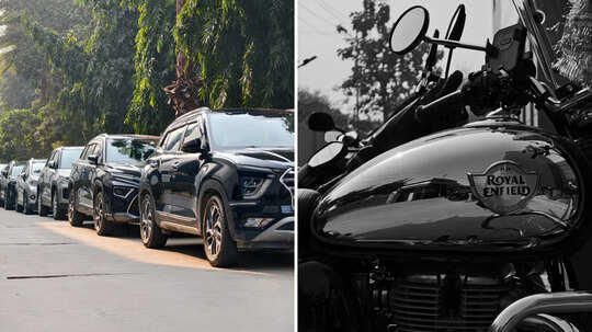 iQOO 15 daylight camera sample with buildings and blue sky