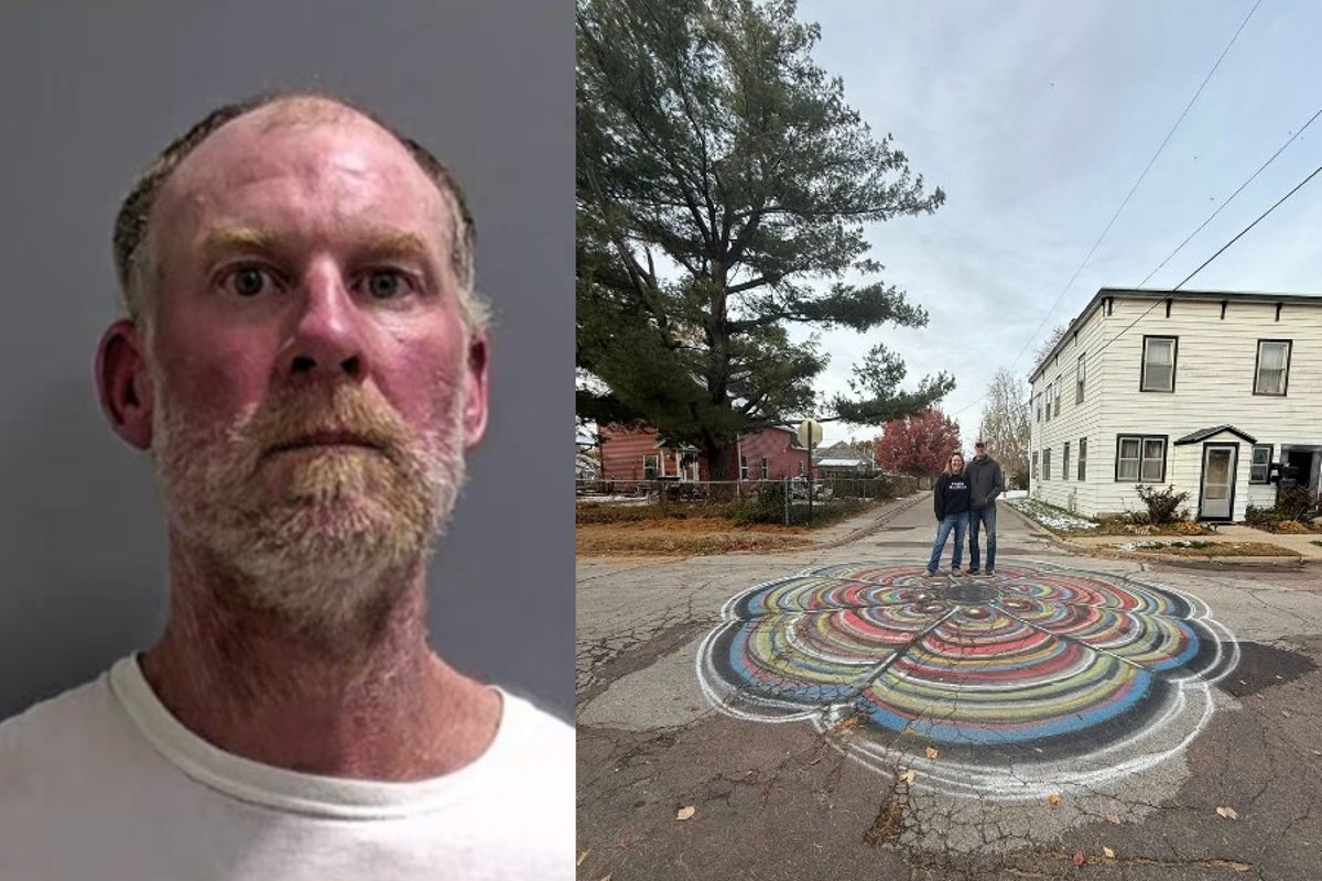 Town backs ‘Manhole Michelangelo’ after officials target public art
