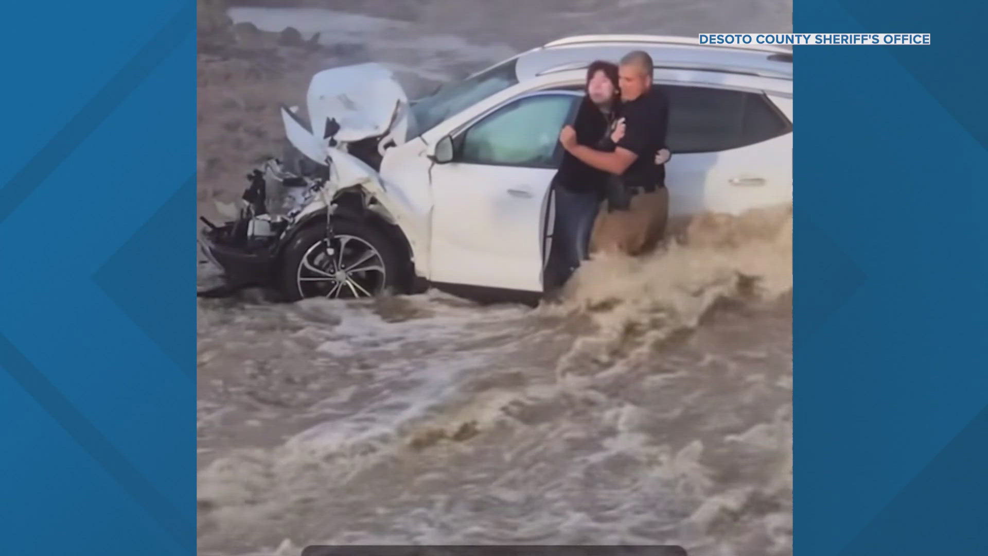Video shows dramatic rescue after car crashes into flooded ravine