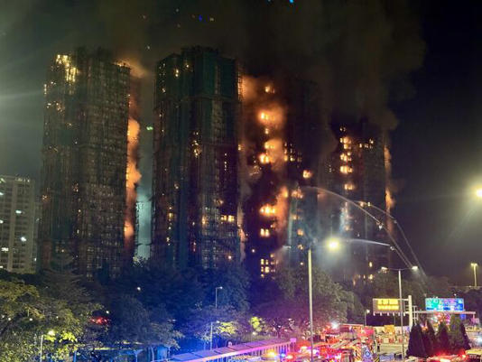Massive Fire Engulfs Hong Kong High-rise Apartment Buildings