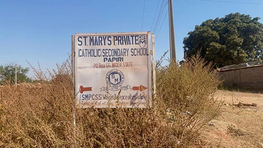 A sign of St. Mary's Catholic Primary and Secondary School, where gunmen on Friday abducted children and staff in Papiri community, Nigeria, Tuesday, Nov.25, 2025.