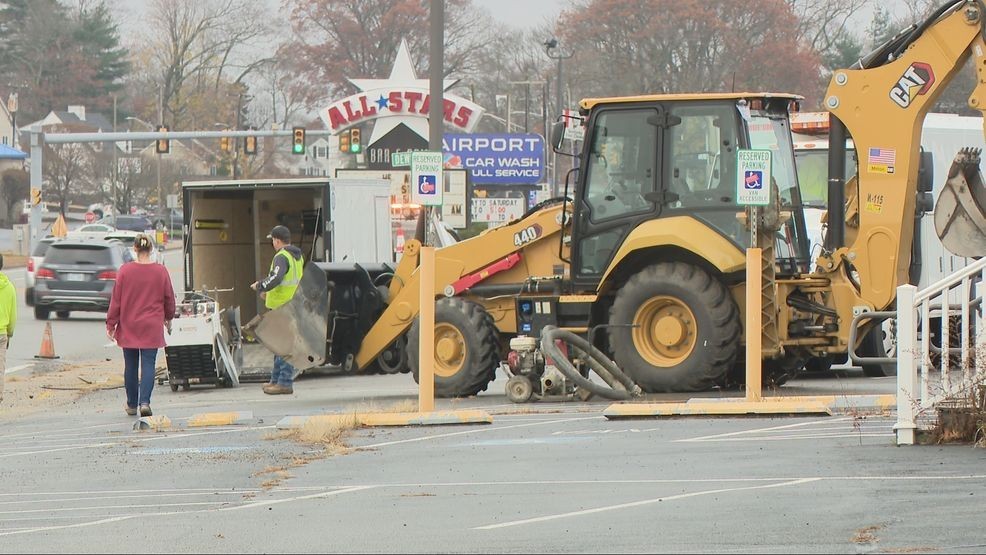 Crews work on water main break on Airport Road in Warwick