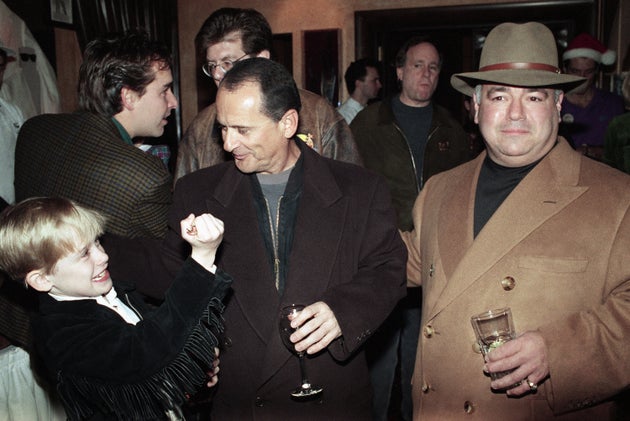 Macaulay Culkin clowns with his co-star Joe Pesci, right, in a pre-production party for the cast and crew in New York on Dec. 7, 1991. via Associated Press