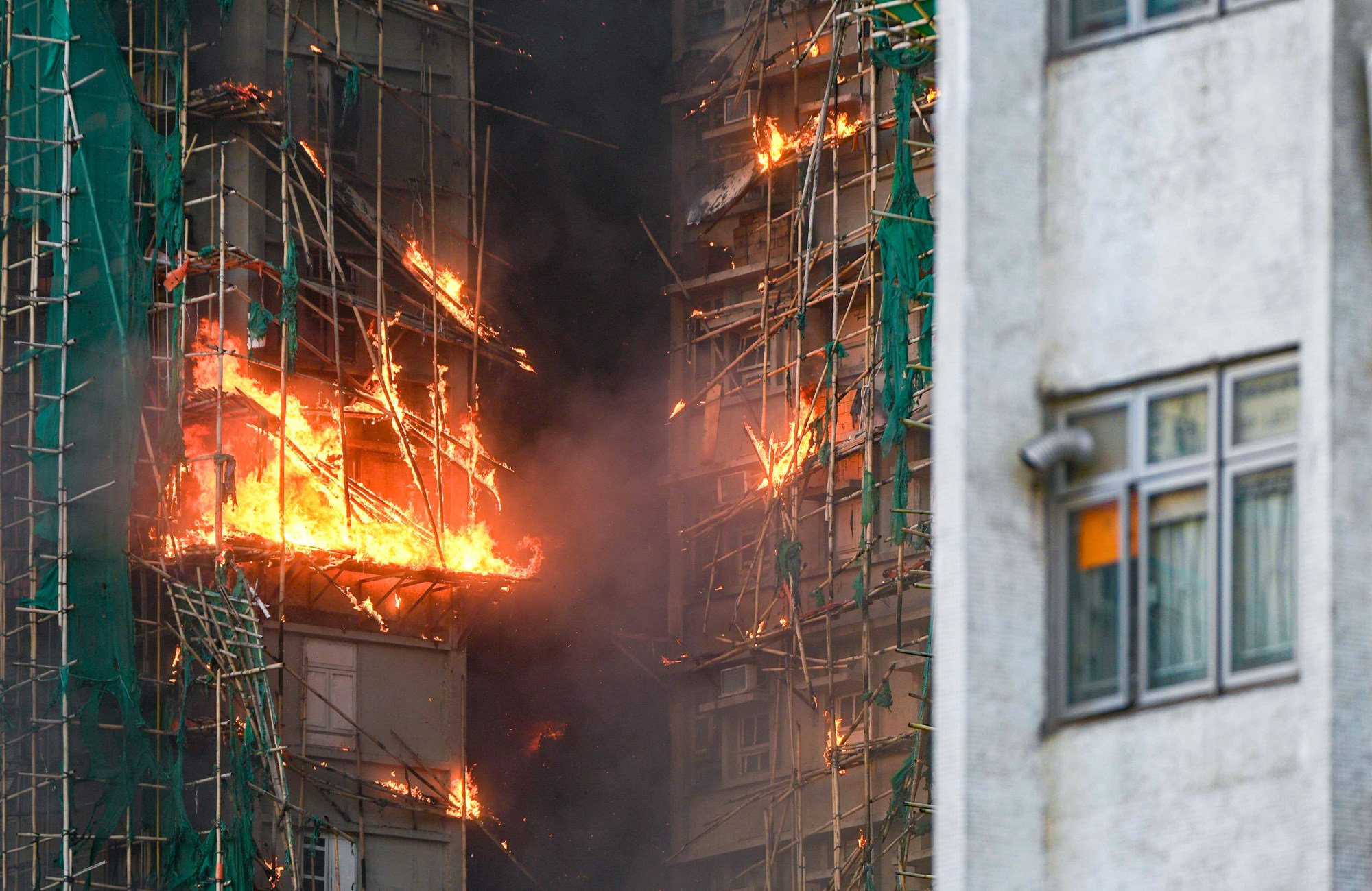 Poor fire retardance and alleged worker smoking among fatal Tai Po ...