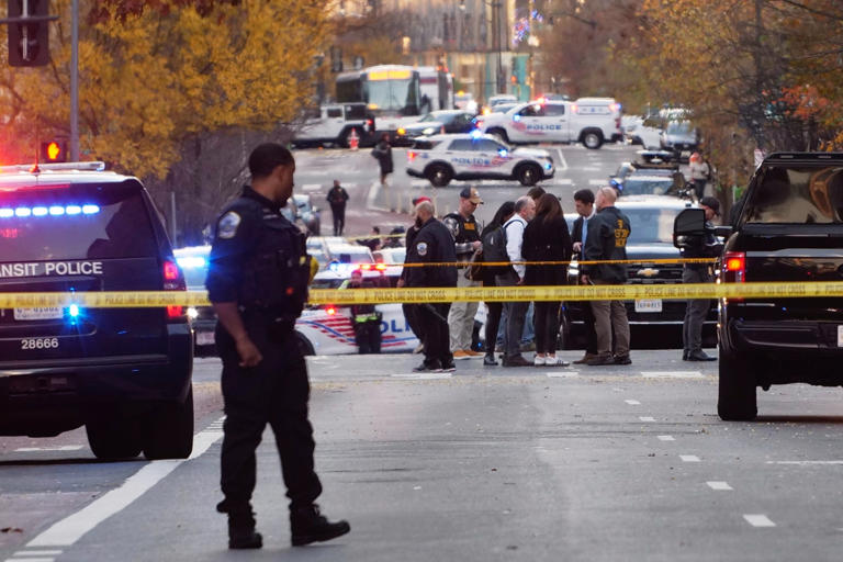 Anthony Peltier/AP - PHOTO: Streets are blocked after reports that two National Guard soldiers were shot near the White House, Nov. 26, 2025.