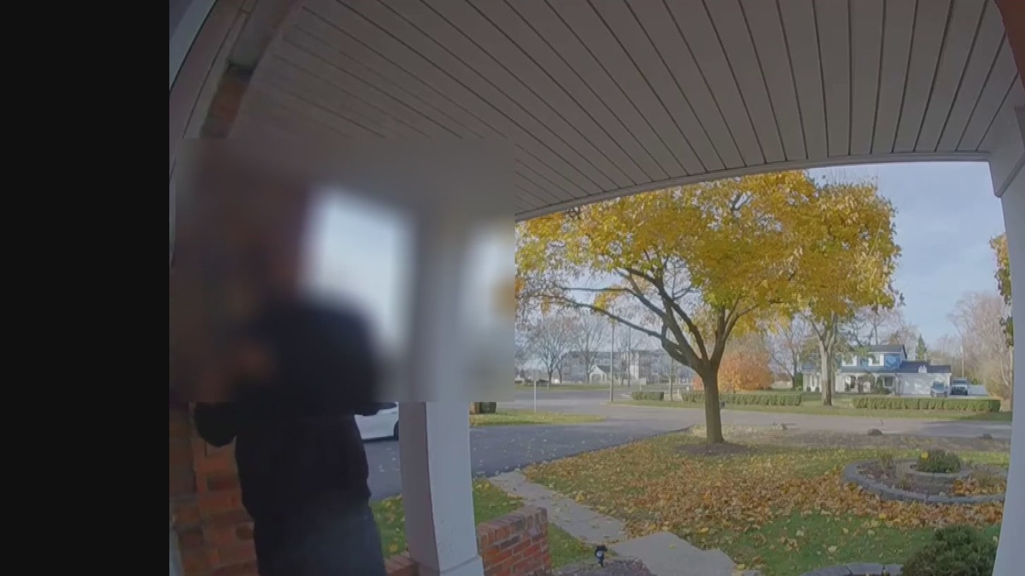 Michigan man charged with firing shots in neighbor's home