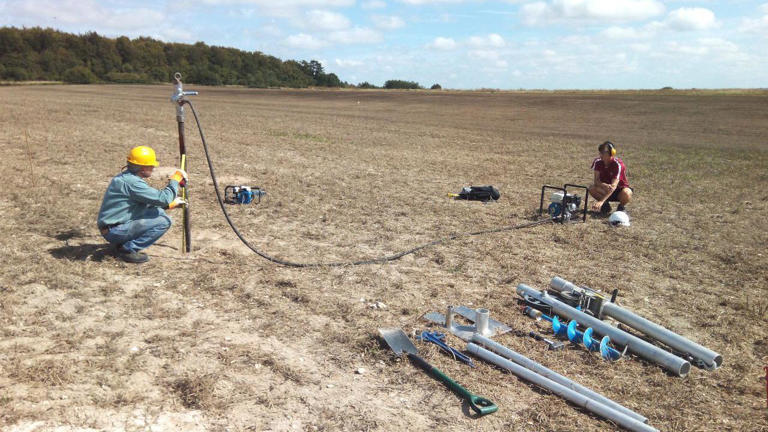 The pits were found with geophysics, then boreholes were made to test the sediment.