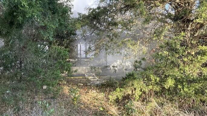 House fire spreads to woods, camper along Augusta Road in Aiken County