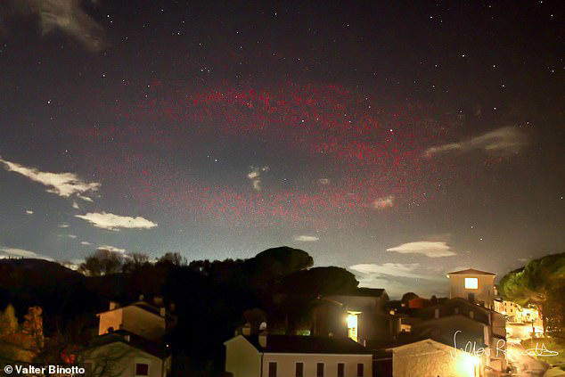 Scientists are baffled as a mysterious halo of red light appears over a ...