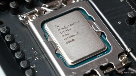 The Intel i5-13600K processor seated on a motherboard.
