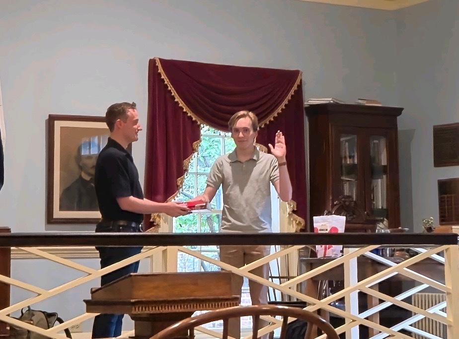 The U-Va. Cereal Club requires that new executive board officers like Emmett O'Brien, who is now club president, be sworn in over their favorite box of cereal.