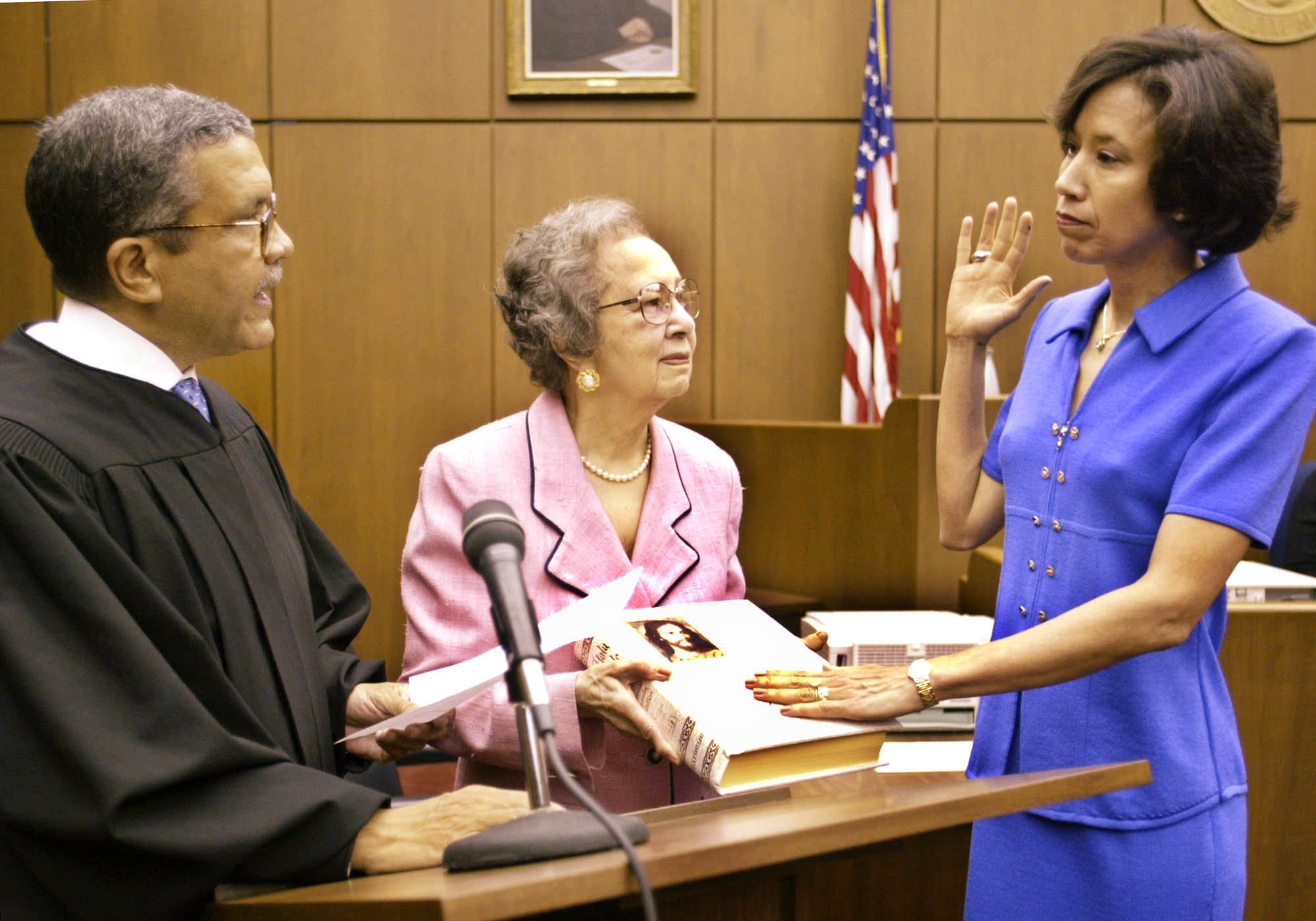 Allyson Duncan, right, is administered the oath by her husband, U.S. Magistrate William A. Webb, to become a judge to the U.S. Court of Appeals for the 4th Circuit in 2003.