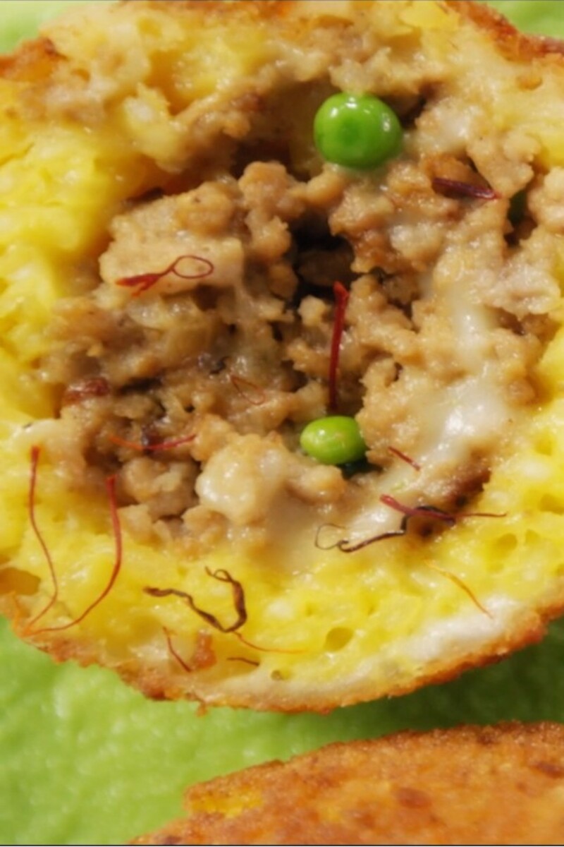 Arancini mit Kalbsbrät und Mozzarellafüllung