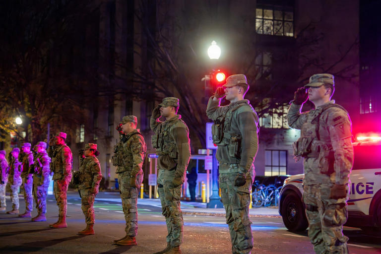 Billy Blankenship/Joint Task Force DC - PHOTO: U.S. service members line the streets of Washington, D.C., during an honor escort, also known as a fallen soldier procession, for U.S. Army Spc. Sarah Beckstrom of the West Virginia National Guard, Nov. 27, 2025.