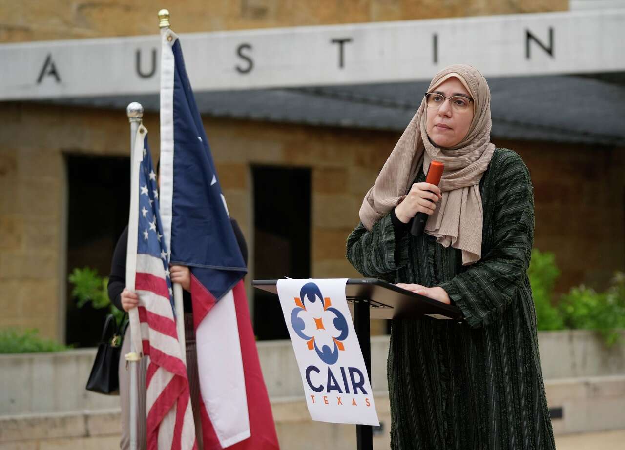 Shaimaa Zayan, operations manager of the Council on American-Islamic Relations Austin office, speaks during a news conference in April 2024 at Austin City Hall regarding an alleged hate crime against a Muslim student and his friend at the University of Texas. (Jay Janner/Austin American-Statesman)