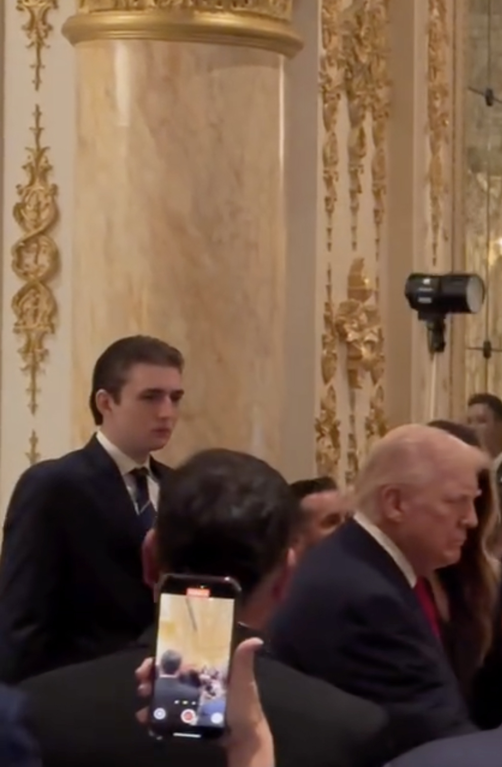 Footage of Barron Trump towering over president dad at Thanksgiving ...