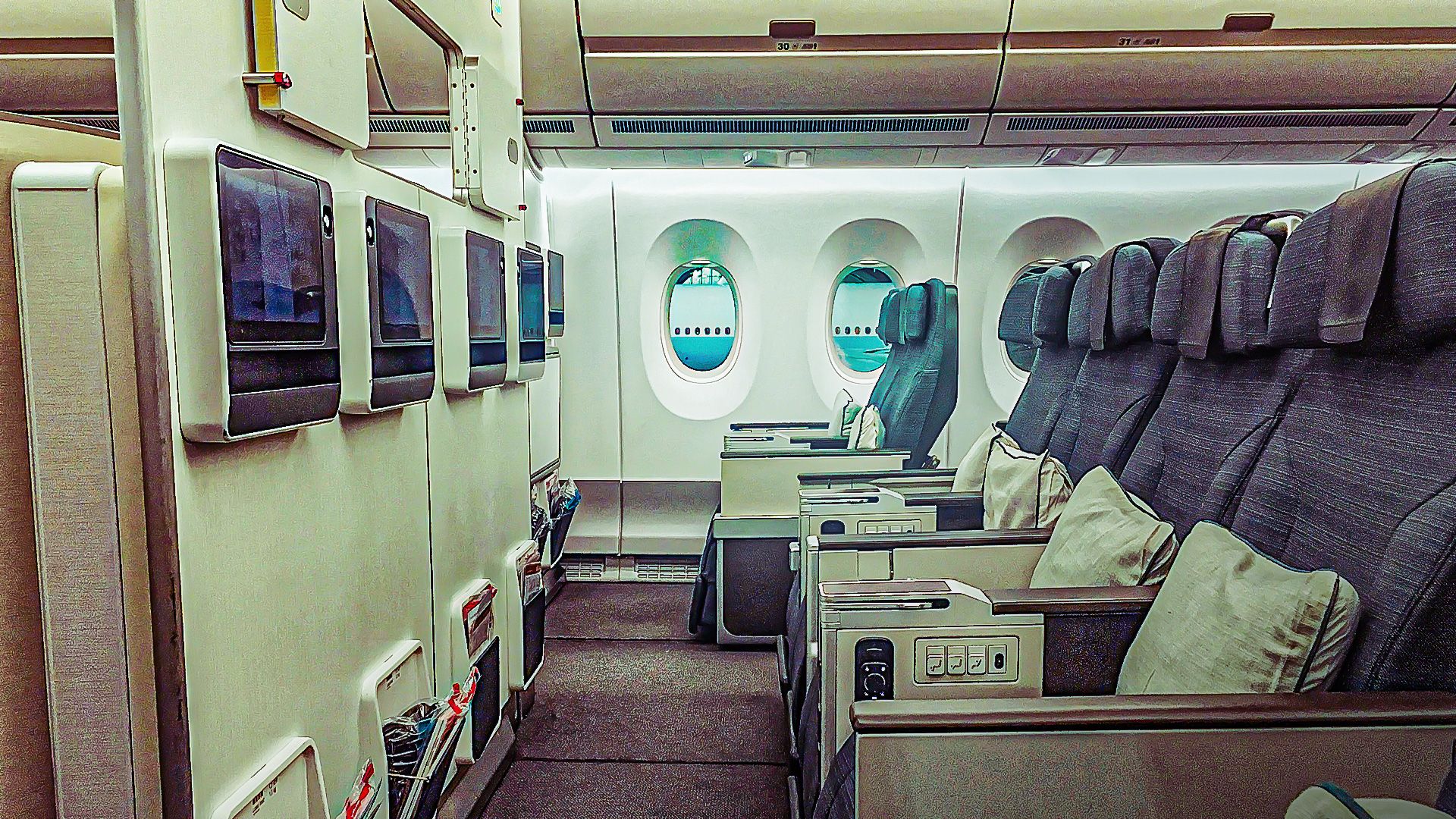 Here's how much more spacious premium economy is compared to economy class