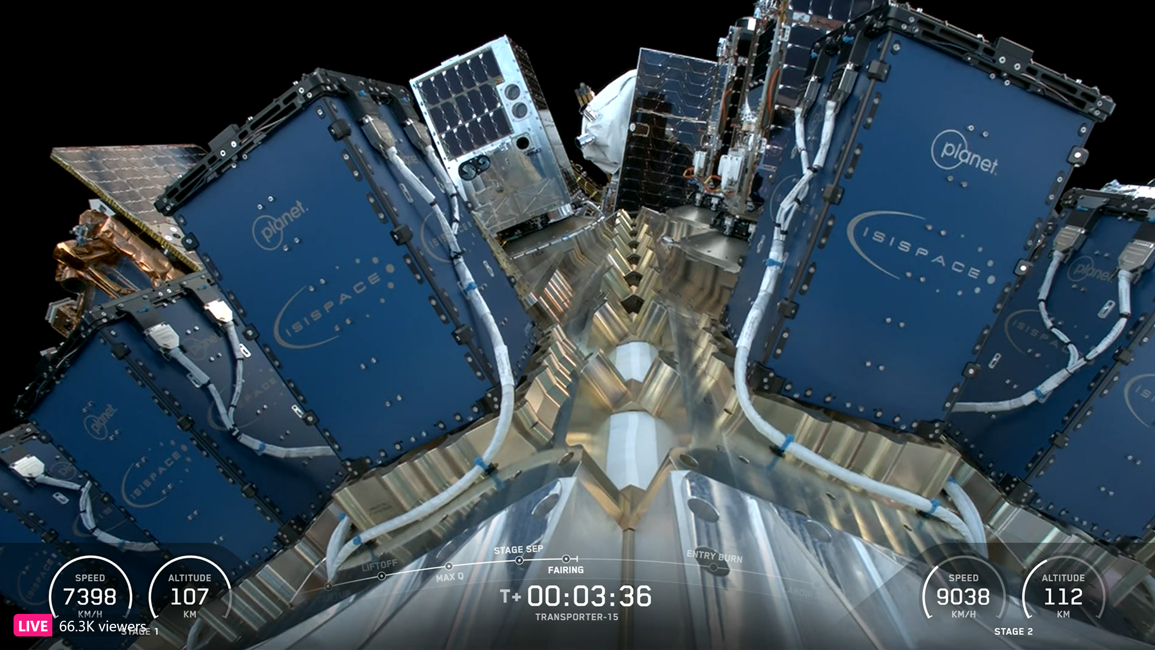 A collection of small satellites packed atop a SpaceX rocket in space.