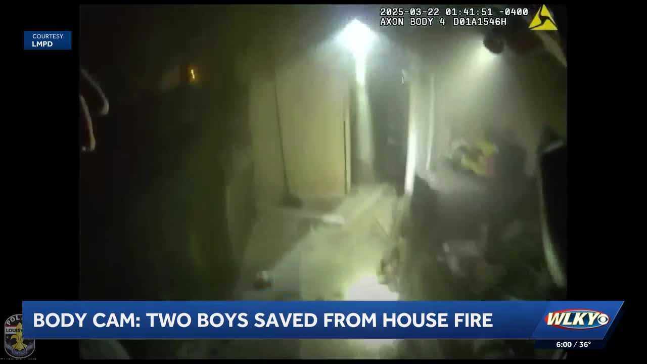 Body cam video shows LMPD officers help save boy from house fire