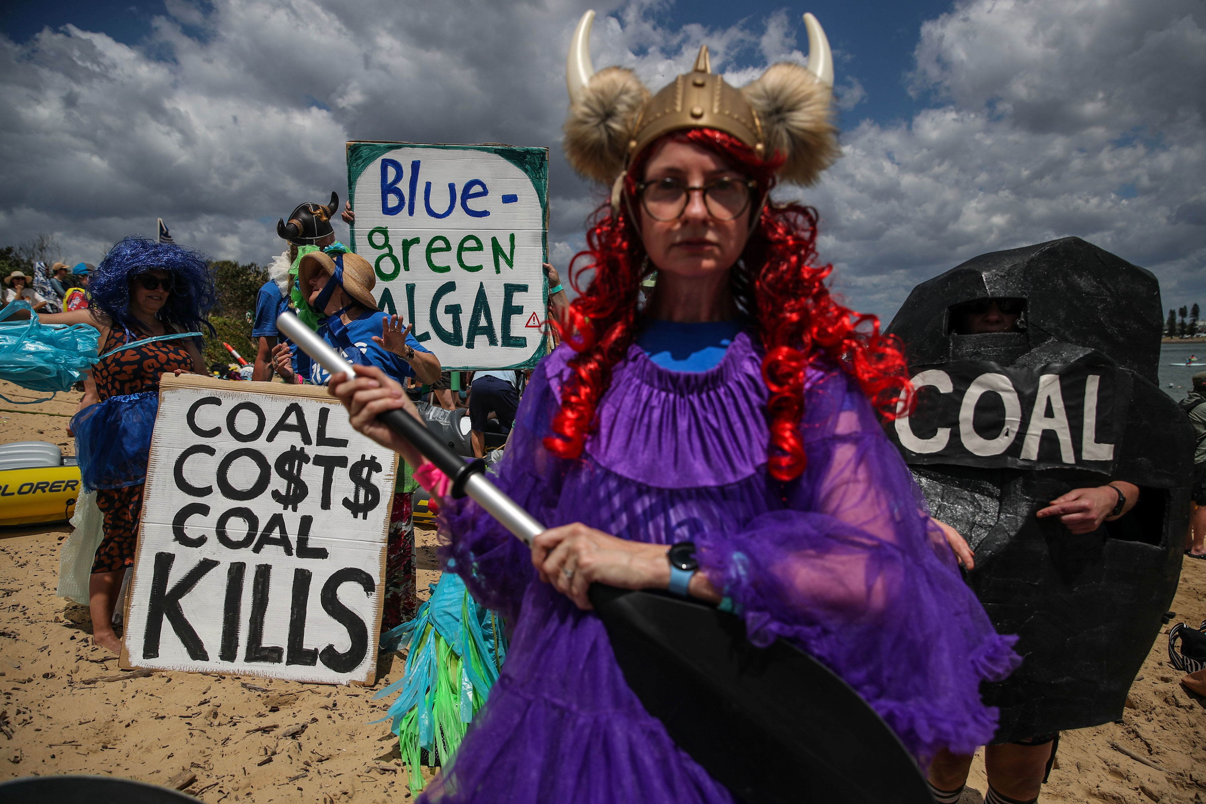 Australia climate change protest disrupts shipping at coal port, 21 ...