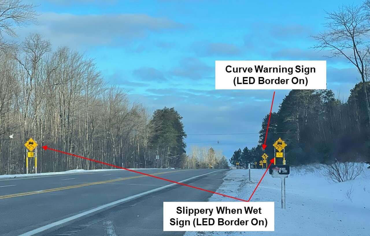 Flashing LED signs help slow drivers on slick Michigan curves
