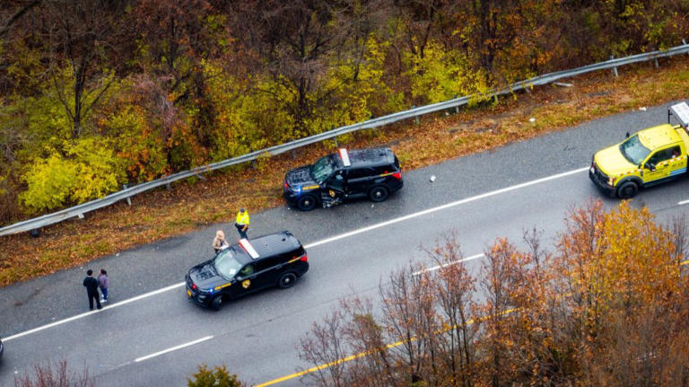 MSP trooper hospitalized after cruiser struck while responding to crash