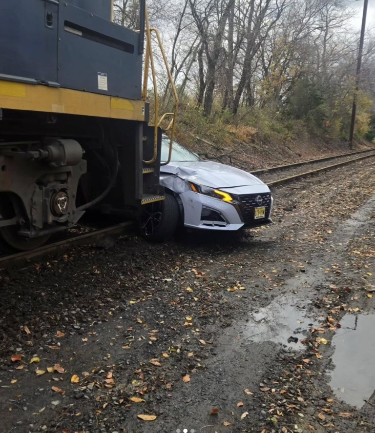Woman survives after freight train pushes her car nearly 500 yards