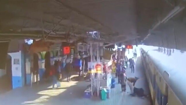Video: Woman slips while boarding train in Haryana, alert railway cop ...
