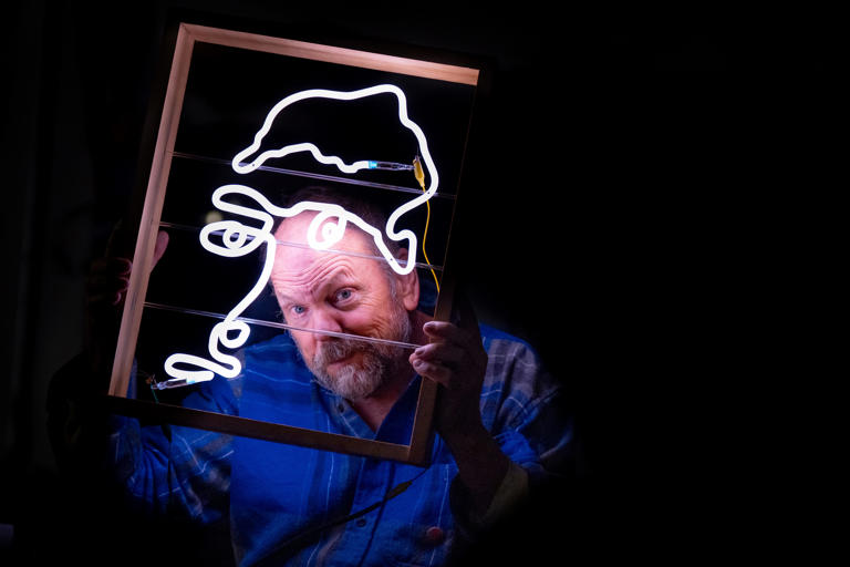 Meet Neal Conner who illuminates Eugene as Neon Man