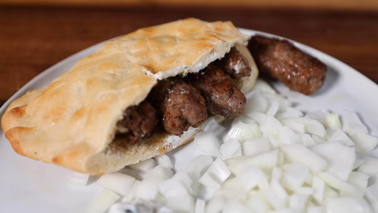 Authentic Bosnian flavors: Cooking ćevapi with fresh somun bread