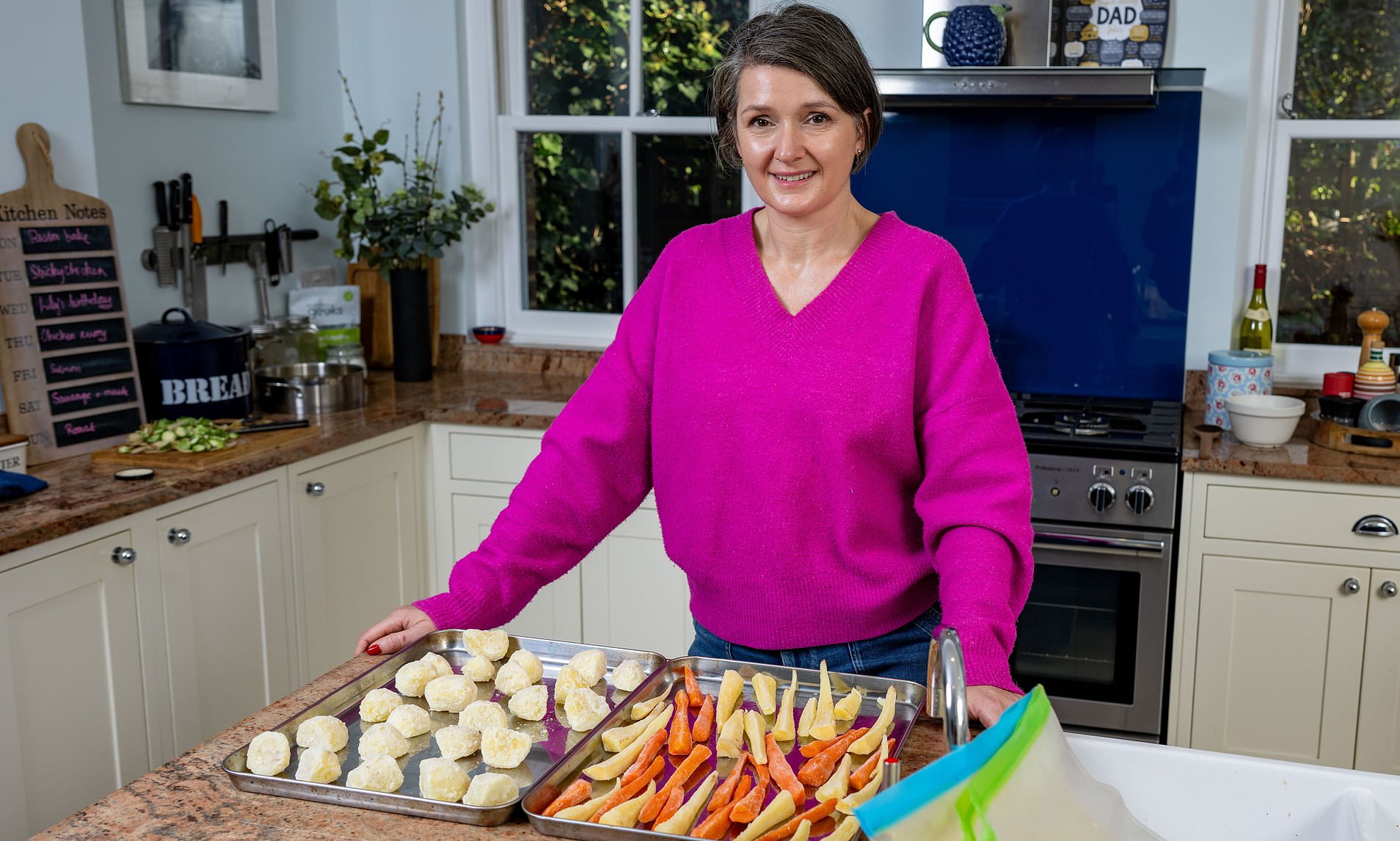 Mother reveals how she cooks her Christmas dinner a month early - and feeds six people for just £65