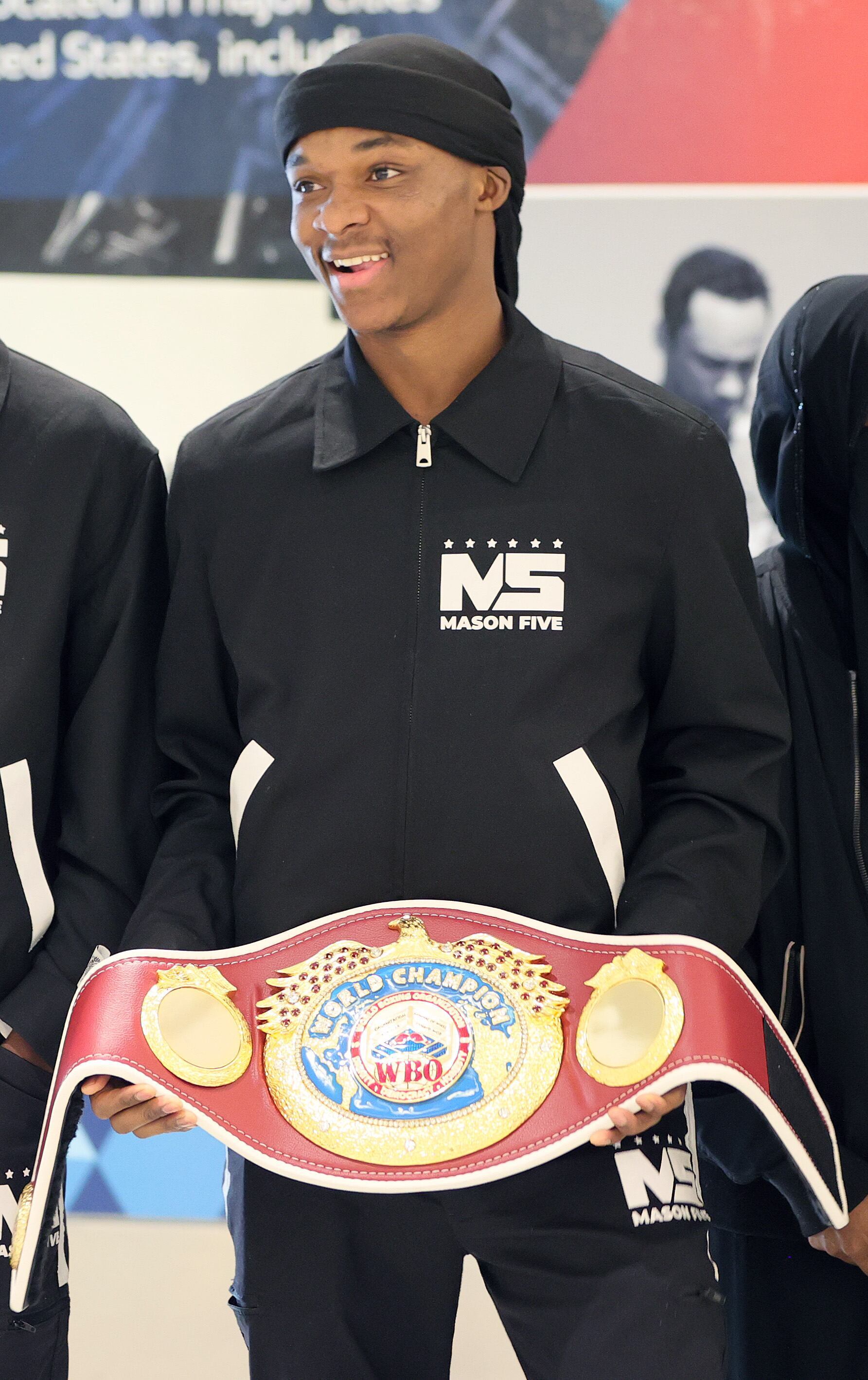 Cleveland boxer Abdullah Mason arrives back home with WBO world lightweight  title belt in tow (photos)