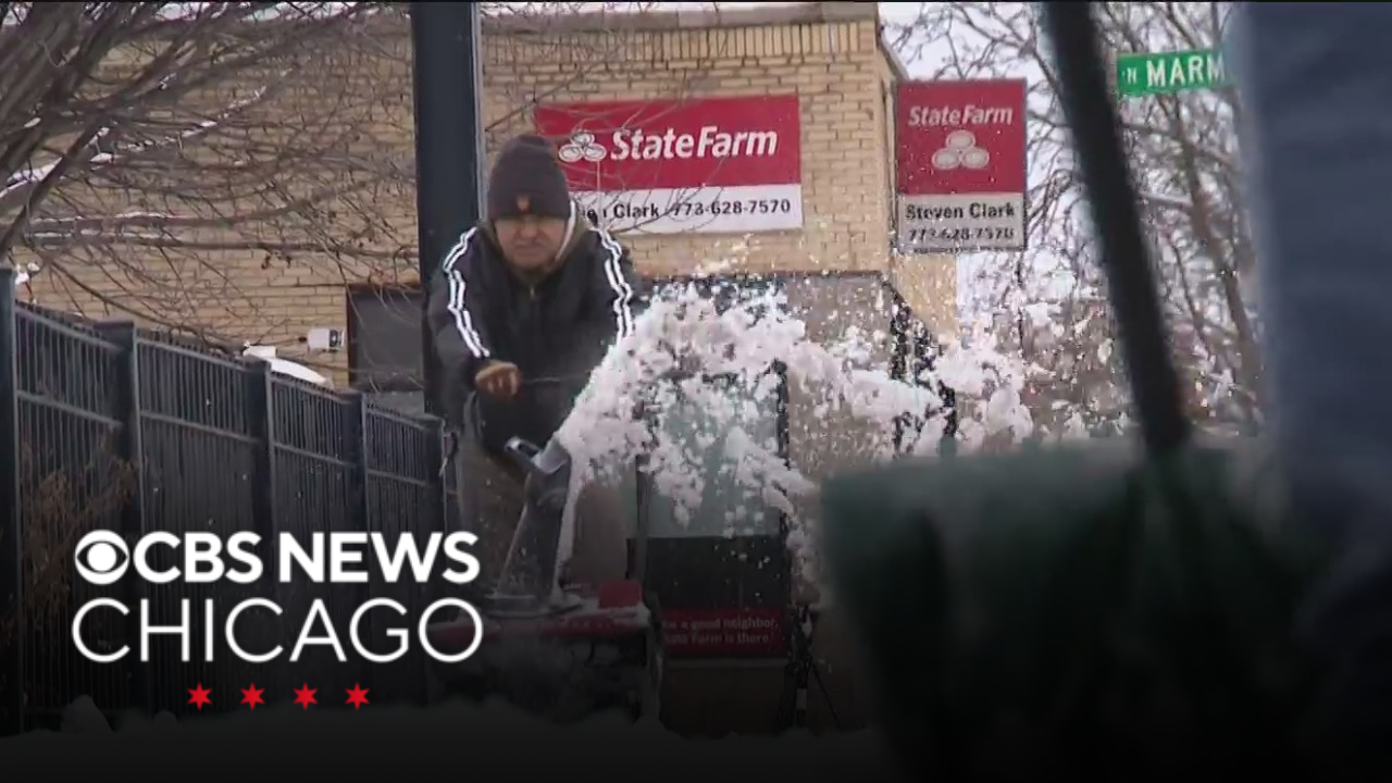 Snow removal underway as another round falls in Chicago