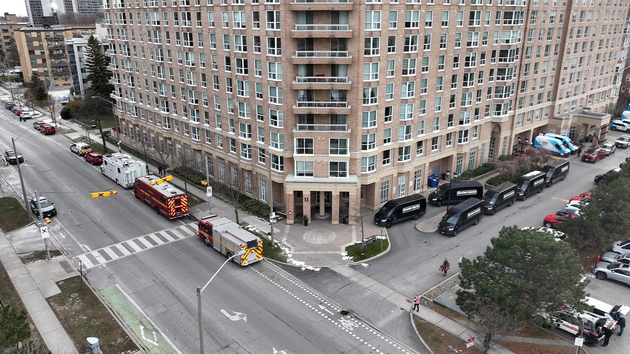 Crews battle stubborn, unseen fire in Toronto apartment complex
