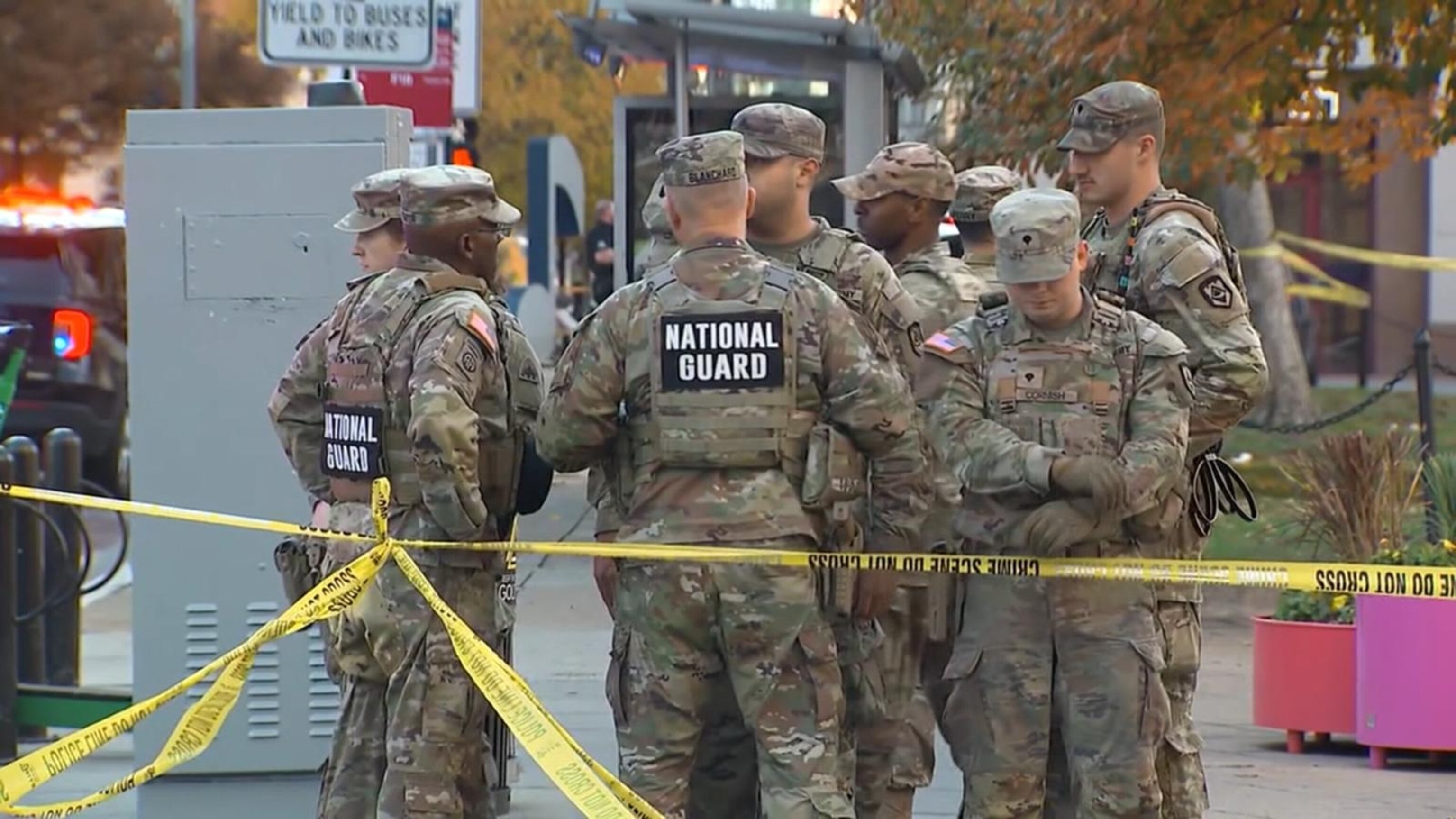 Investigators search for motive after deadly National Guard ambush
