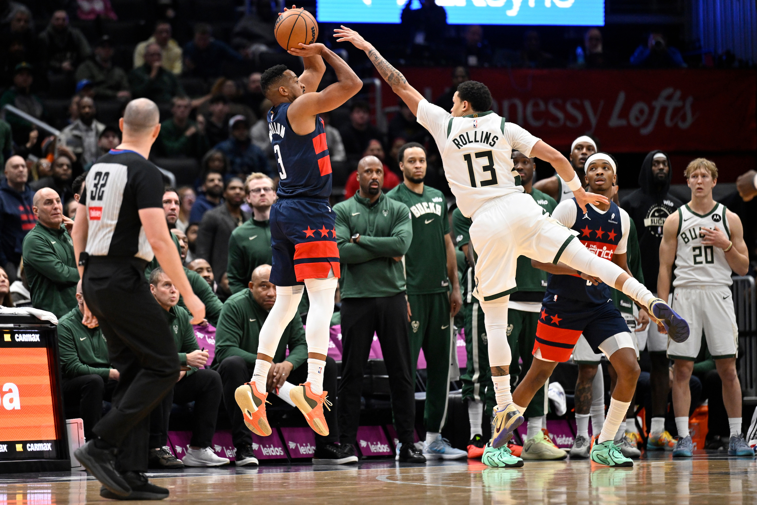 nba-cj-mccollum-khris-middleton-lift-wizards-over-bucks