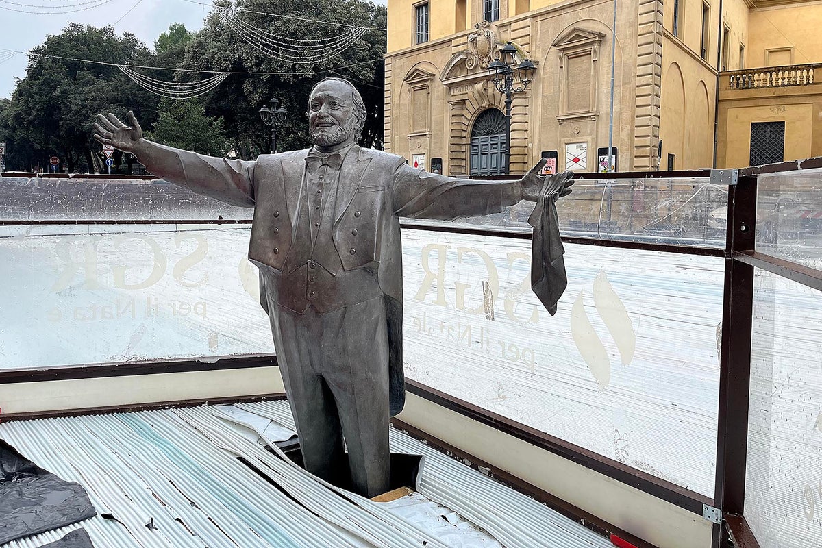 Pavarotti’s widow furious after town builds ice rink around statue