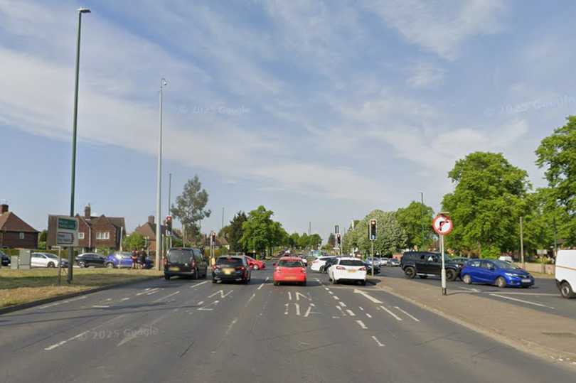 Major road blocked after car flips onto its roof and woman taken to ...