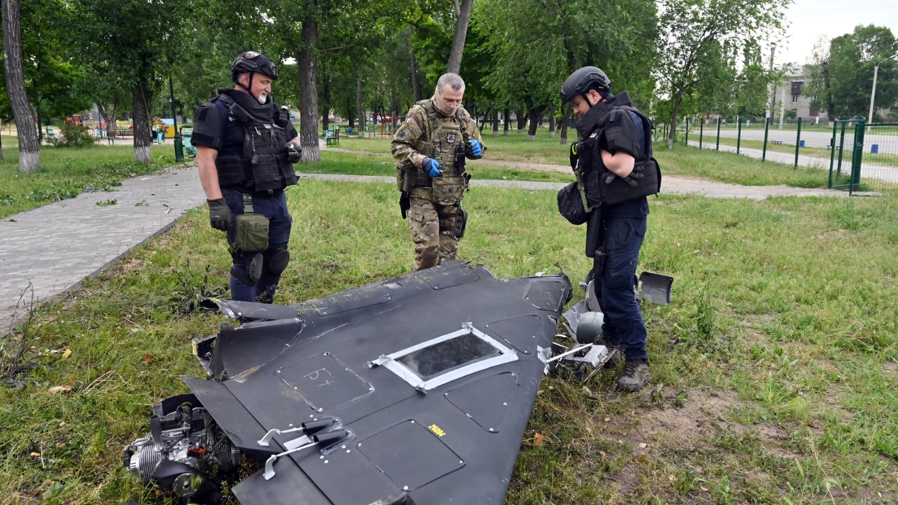 Watch Russian Drone Shot Down by Ukrainian Helicopter Gunner